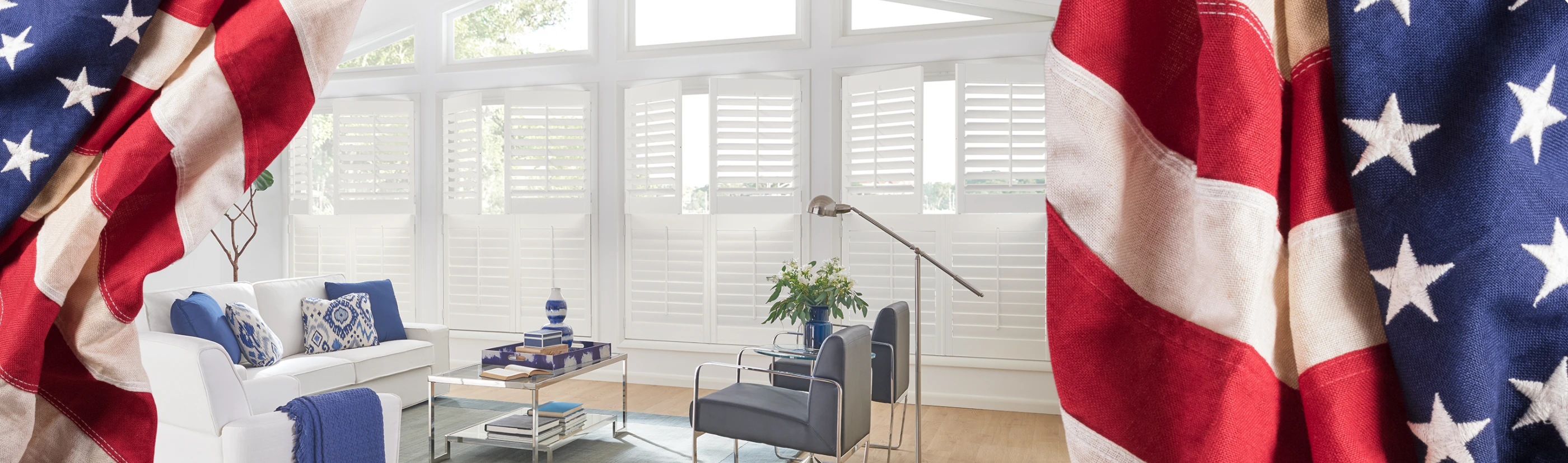 White Polywood shutters in a cozy white and wooden features in a medium size living room 